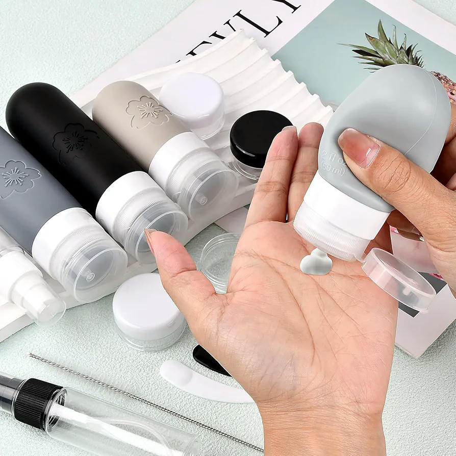 Botellas de viaje de silicona, set de 18 piezas, contenedores portátiles rellenables con bolsa transparente, recipientes para champú, lociones y líquidos (Gris)