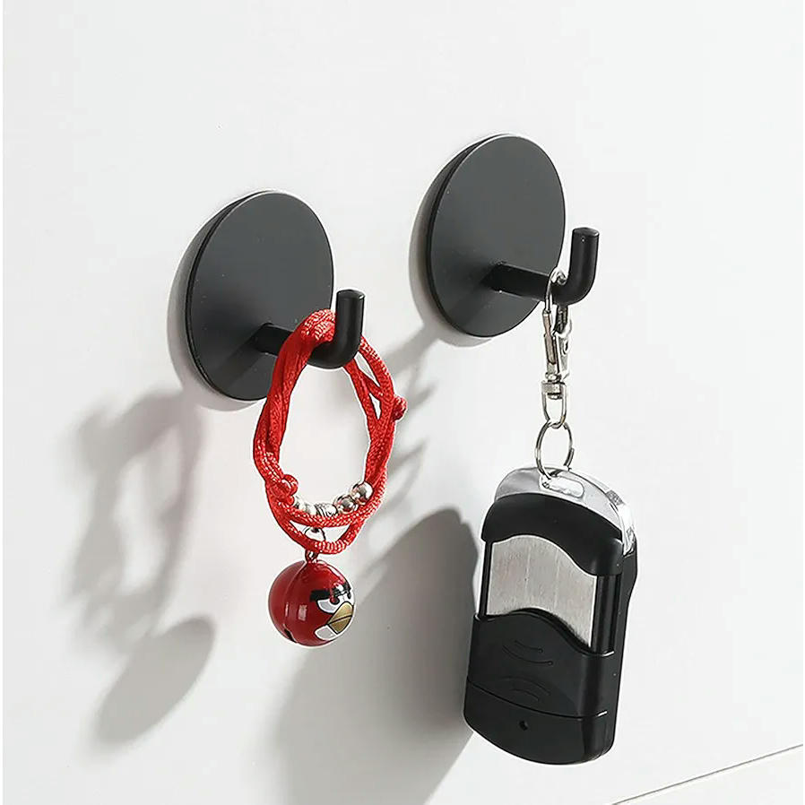 Ganchos autoadhesivos de acero inoxidable, 4 piezas para toallas y llaves, resistentes y fáciles de instalar (Negro)
